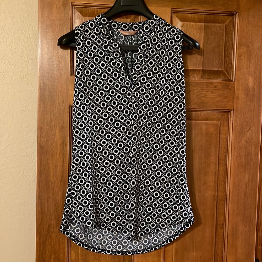 Blue sleeveless blouse